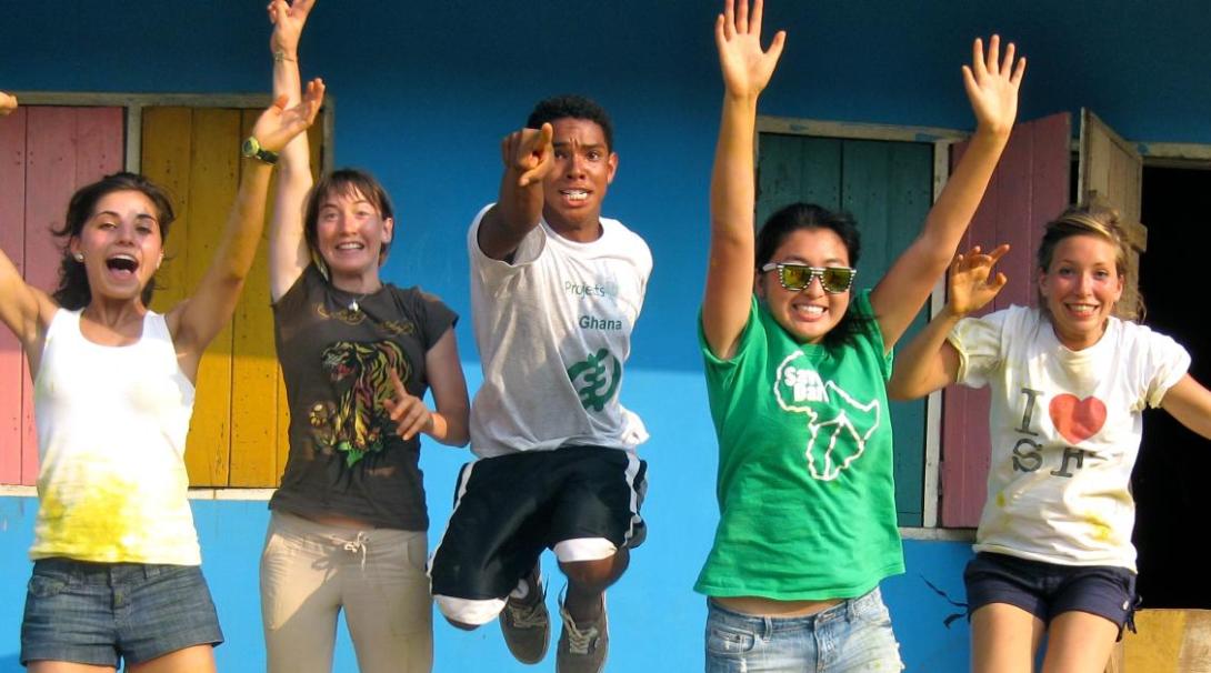High school volunteers jump for joy High school students on volunteer project